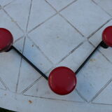 Vintage black and red metal wall coat rack