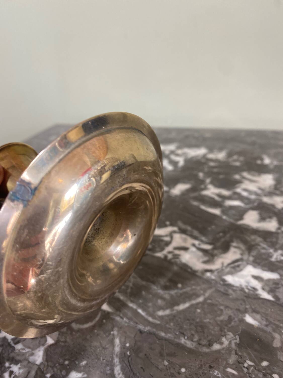 Enameled brass candle holder