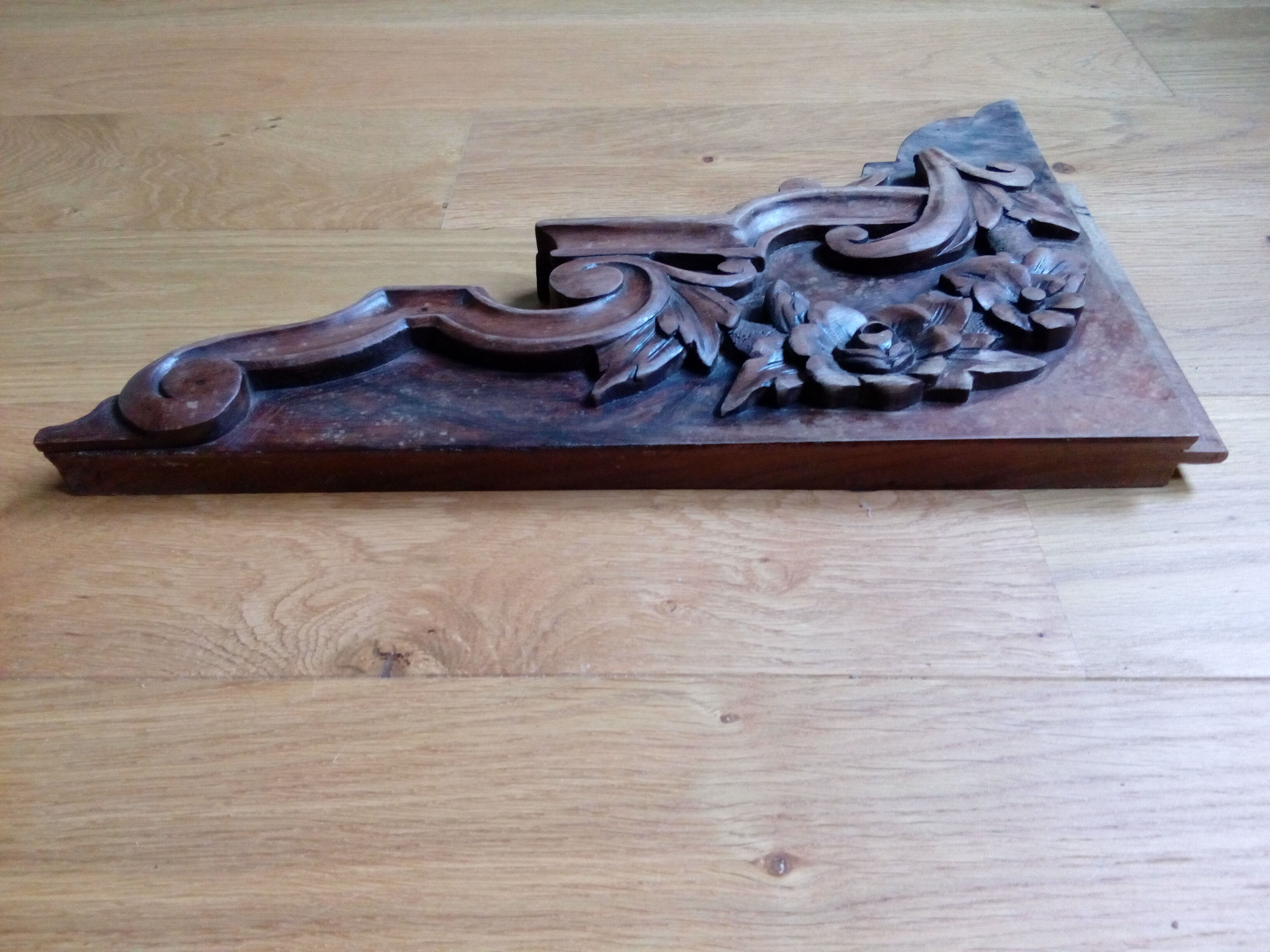 Carved wooden pediment
