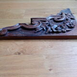 Carved wooden pediment