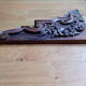 Corbeau en bois sculpté