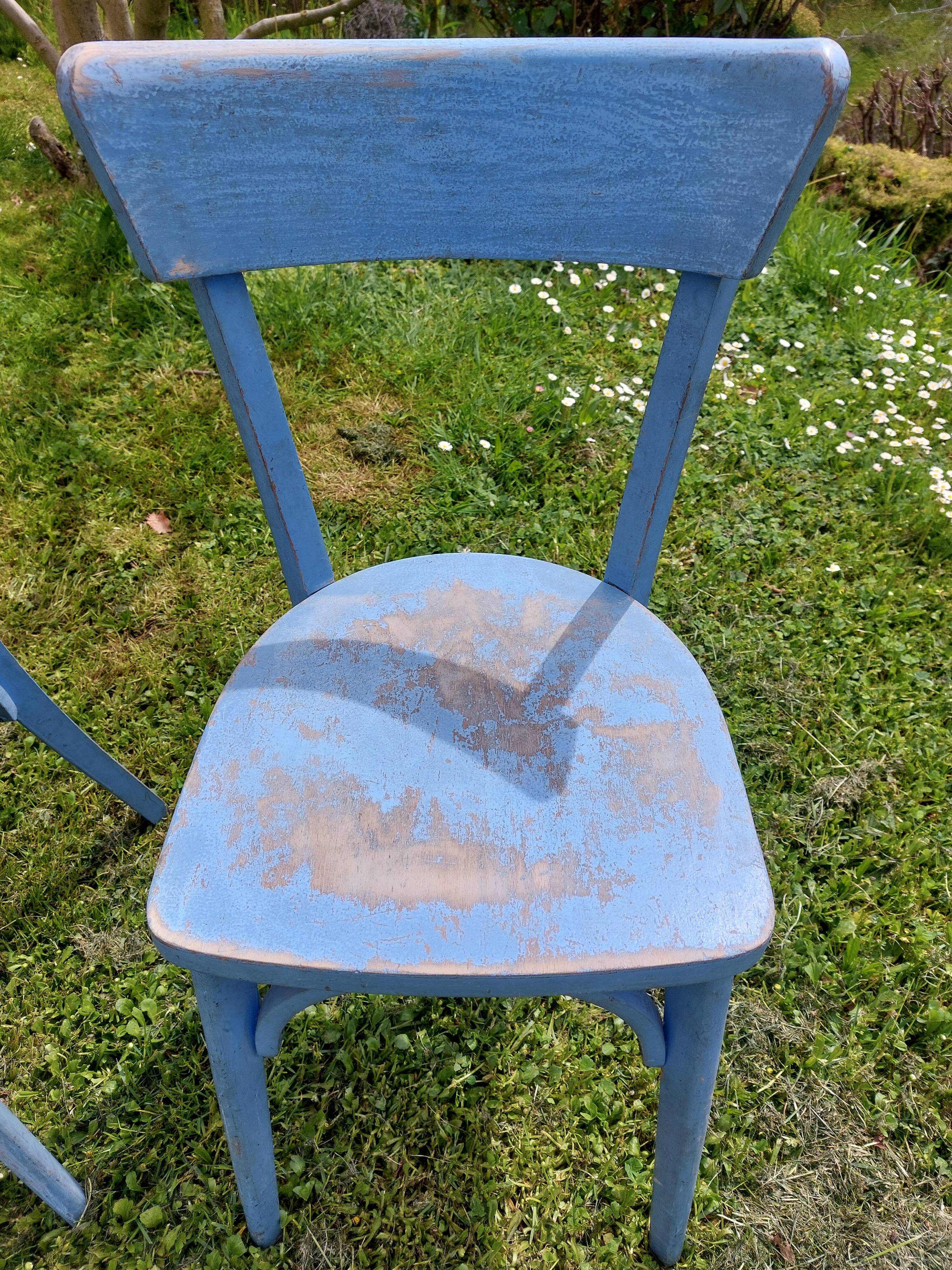 pair of chippy blue paint bistro chairs
