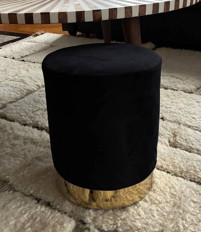 Black velvet cylindrical pouf