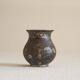 Antique pyriform Bidri vase in the shape of a pyramid.