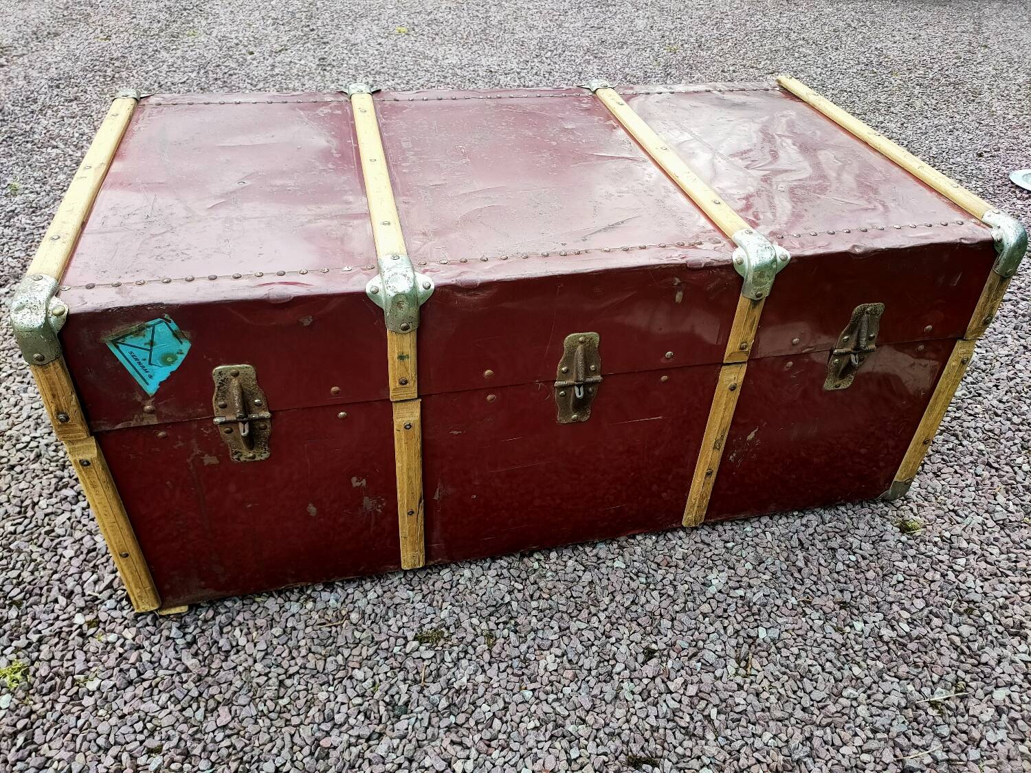 Old metal and wood travel trunk