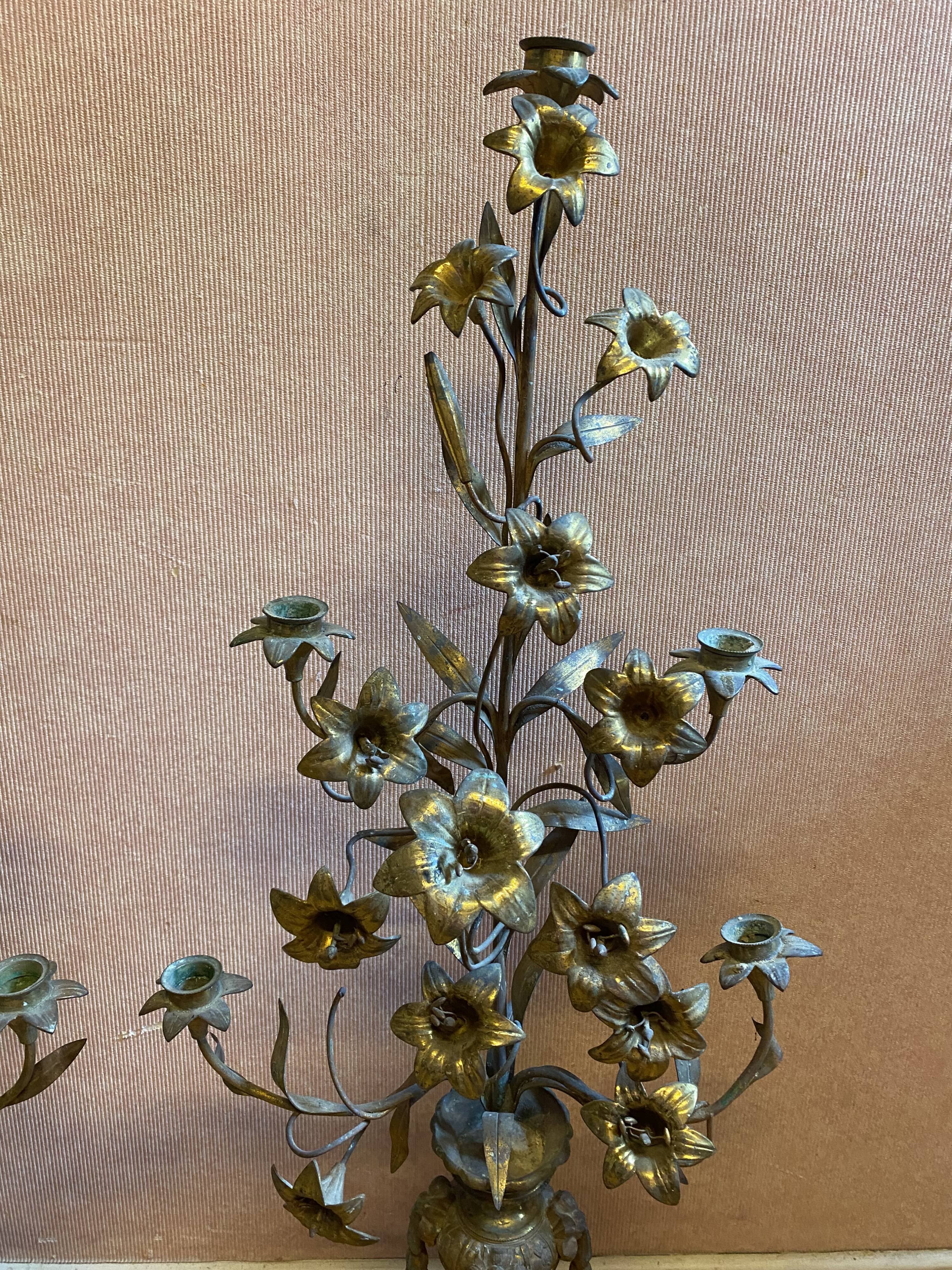 Pair of gilded bronze church candelabras.