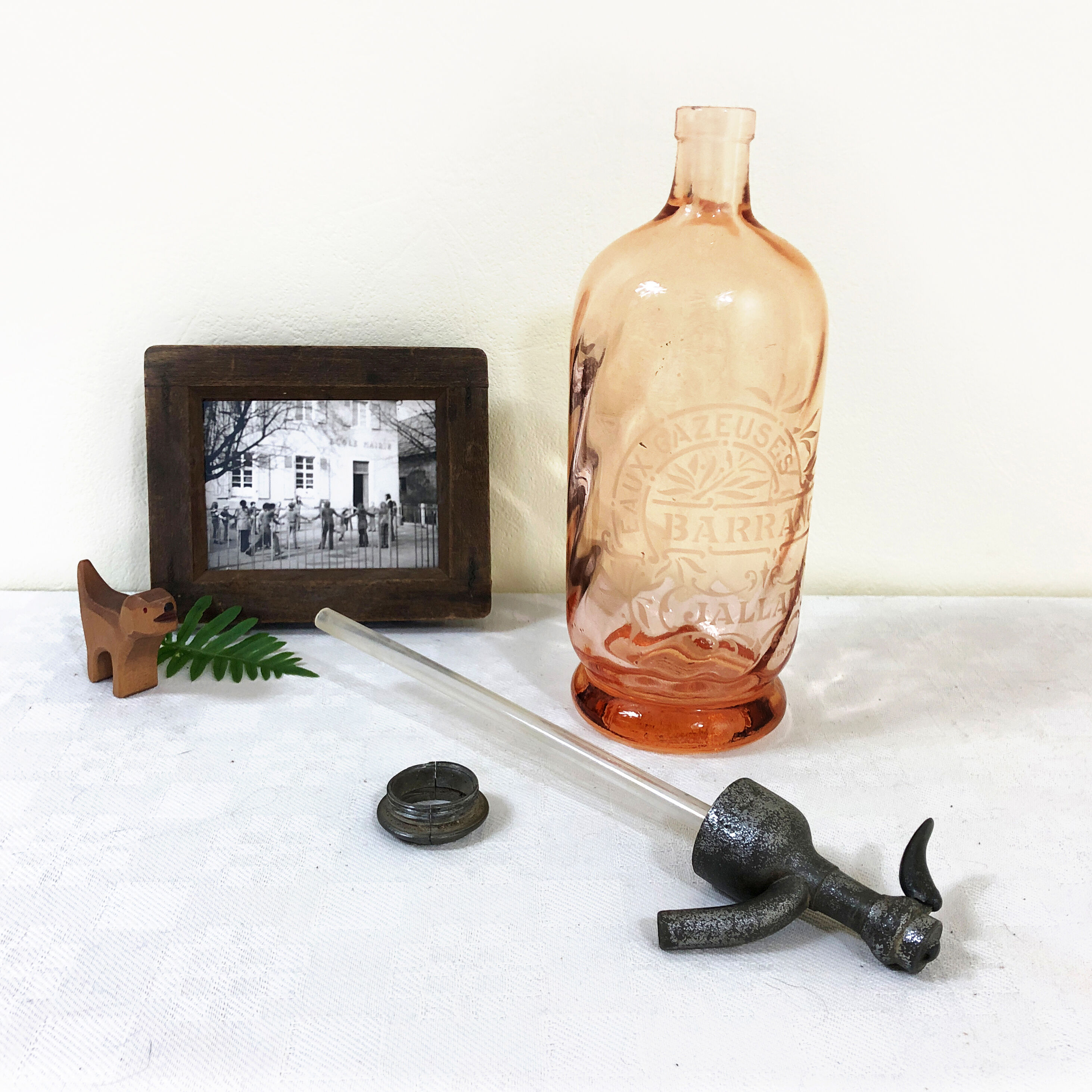 Old twisted pink glass siphon