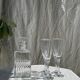 Set of 5 glass champagne flutes with twisted ribbed base