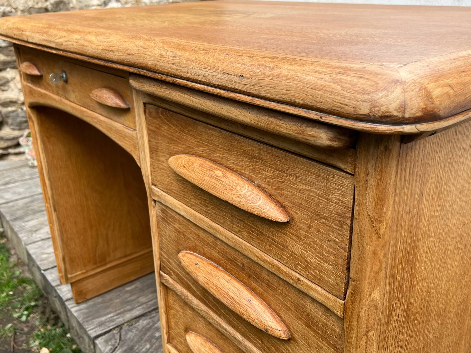Antique light oak desk from the 1950s with 4 drawers