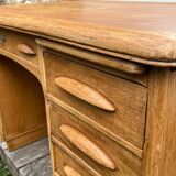 Antique light oak desk from the 1950s with 4 drawers