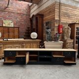 Old workshop furniture transformed into a TV unit.
