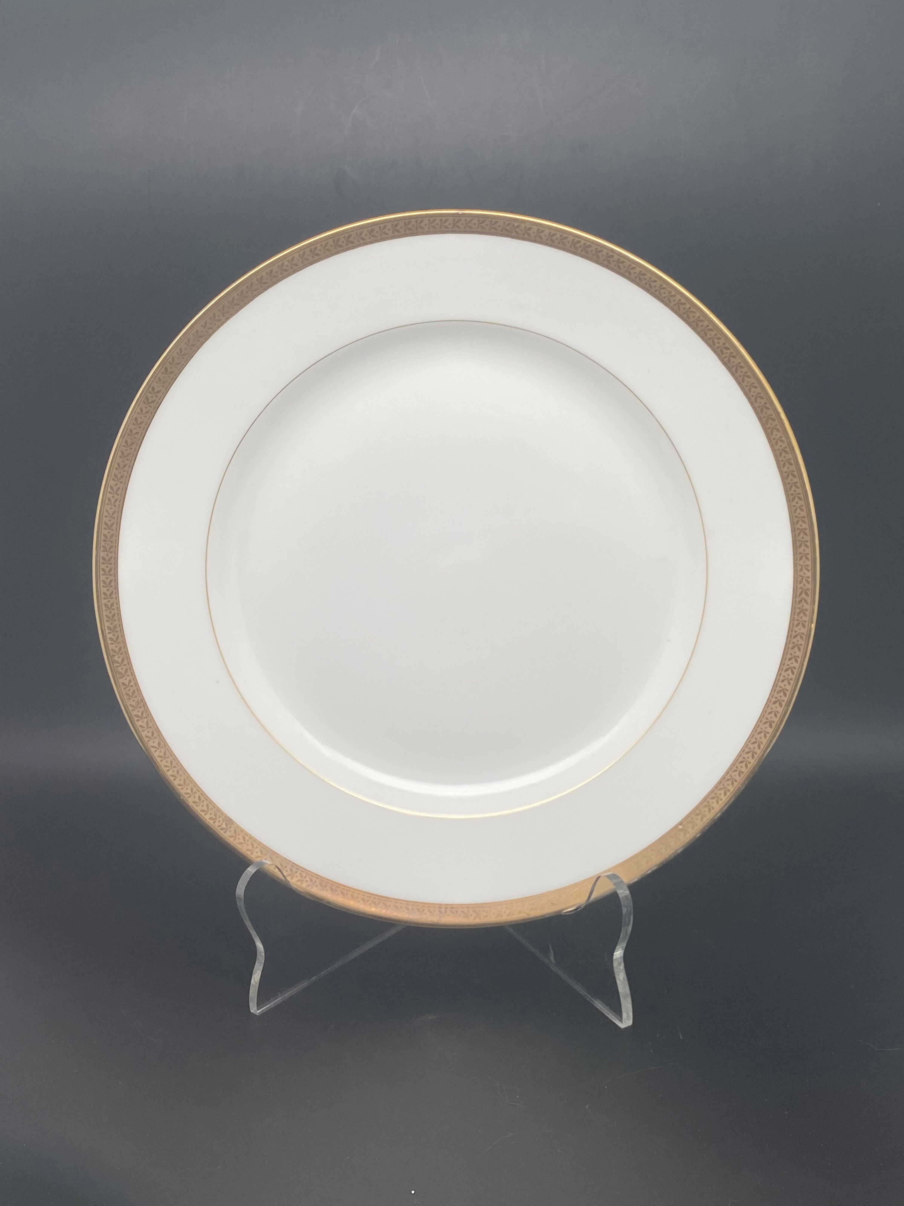 Round porcelain dish from Limoges golden tower
