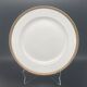 Round porcelain dish from Limoges golden tower
