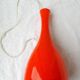 Orange glass suspension