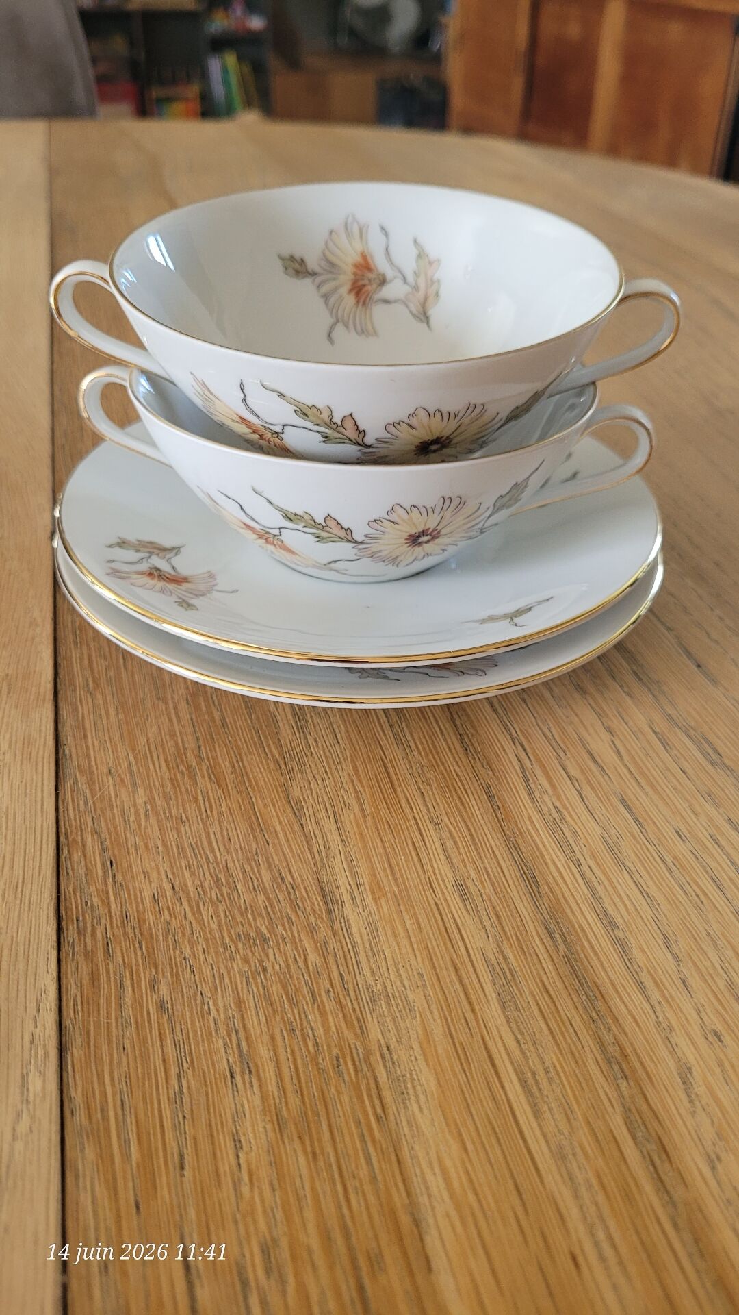 2 large antique cups and their saucers