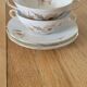 2 large antique cups and their saucers