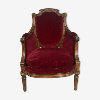 Bergère de style louis xvi garnie de velours rouge sombre, début xixe