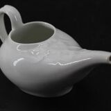 Ancien saucier en faïence blanche