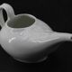 Ancien saucier en faïence blanche