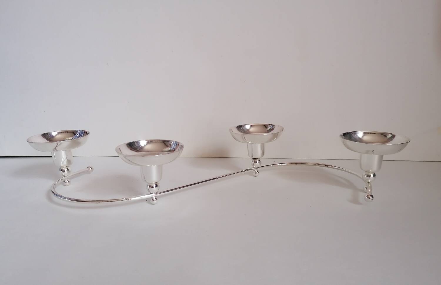 4-light silver metal candle holder