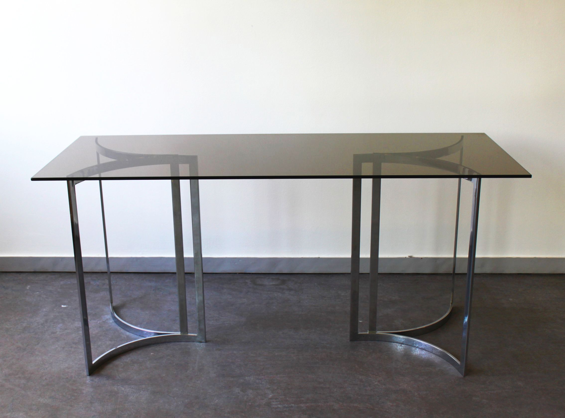 Smoked glass console with chrome legs, 1970.