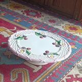 Footed dessert plate in barbotine porcelain, marked FG.