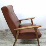 Vintage armchair in wood and imitation leather