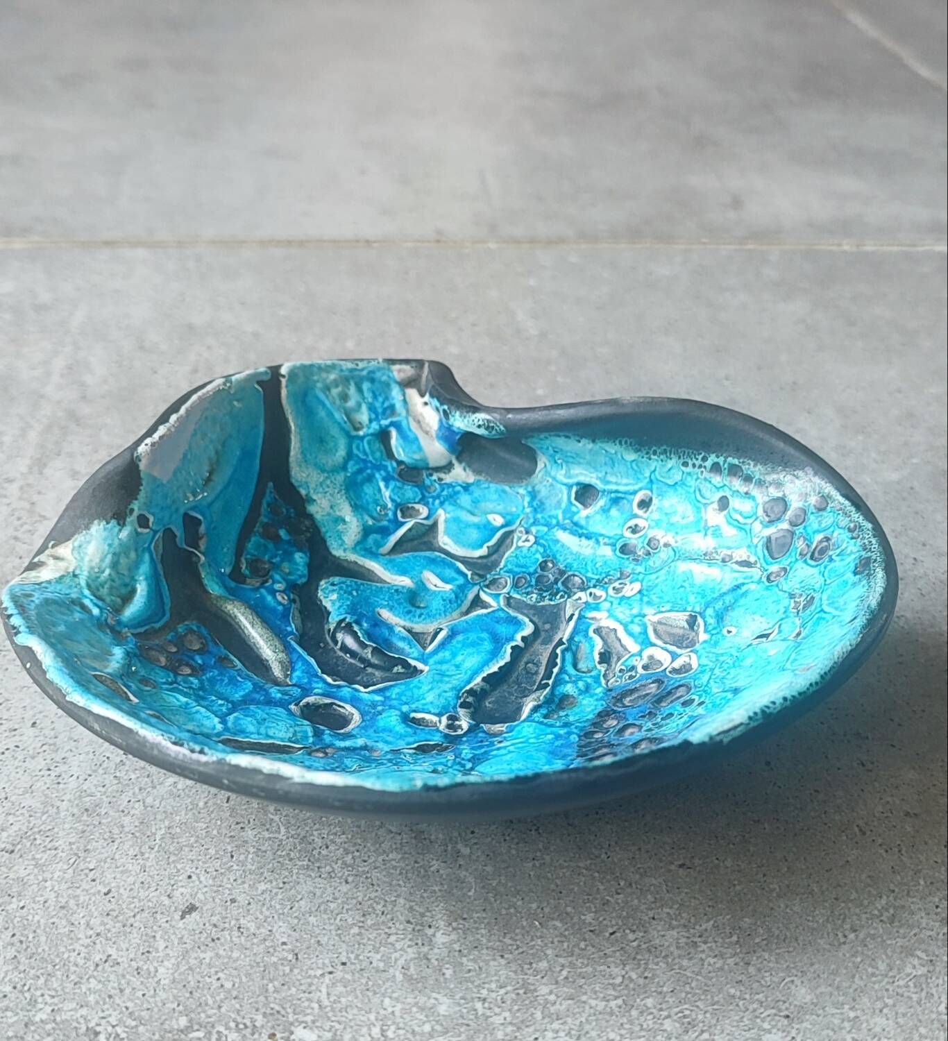 Cyclops ceramic pocket emptier by Emaux des Glaciers