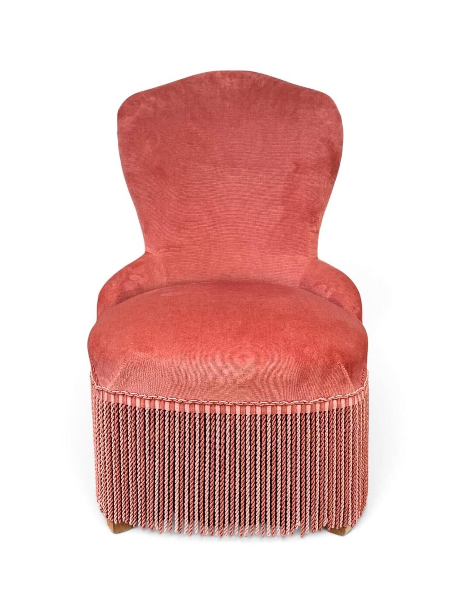 Vintage pink velvet fringed armchair