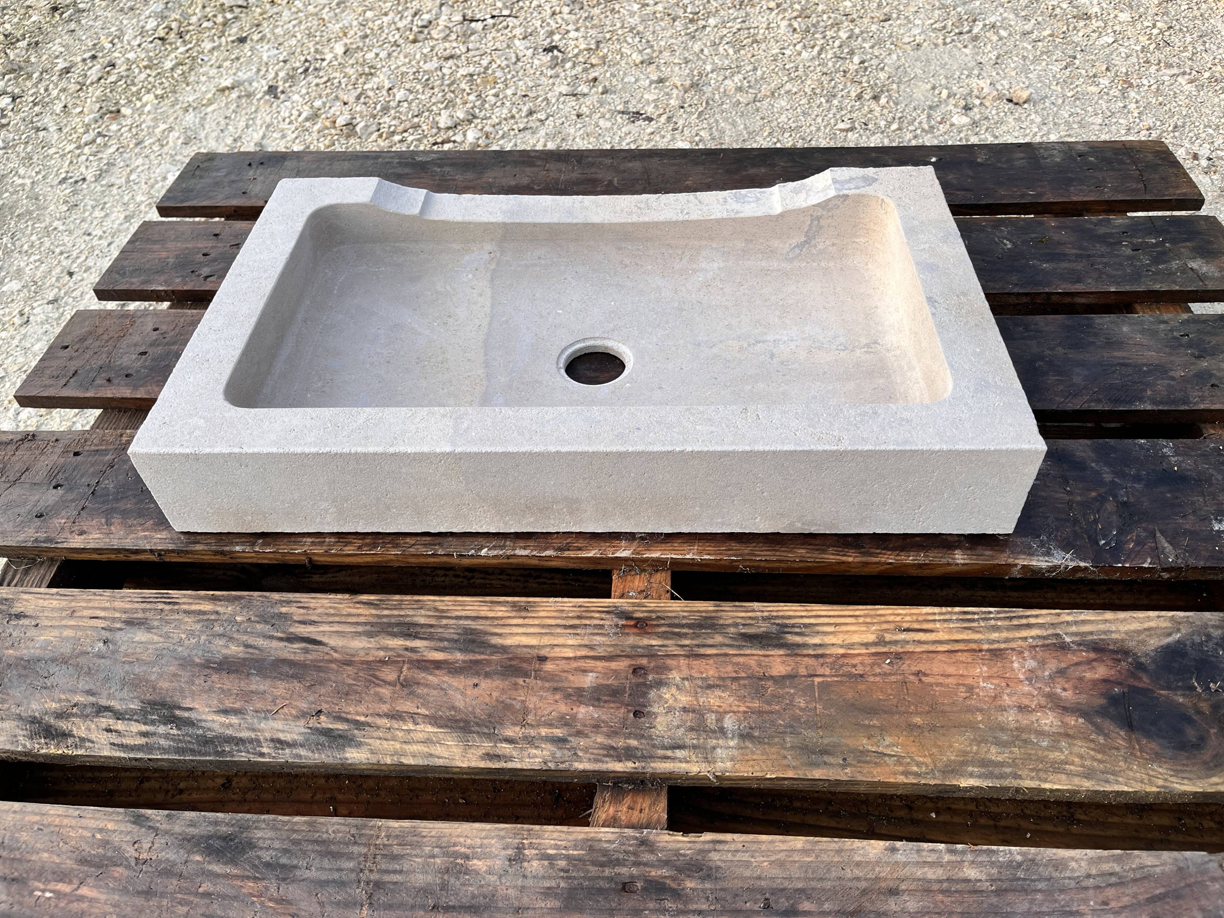 Cut stone sink