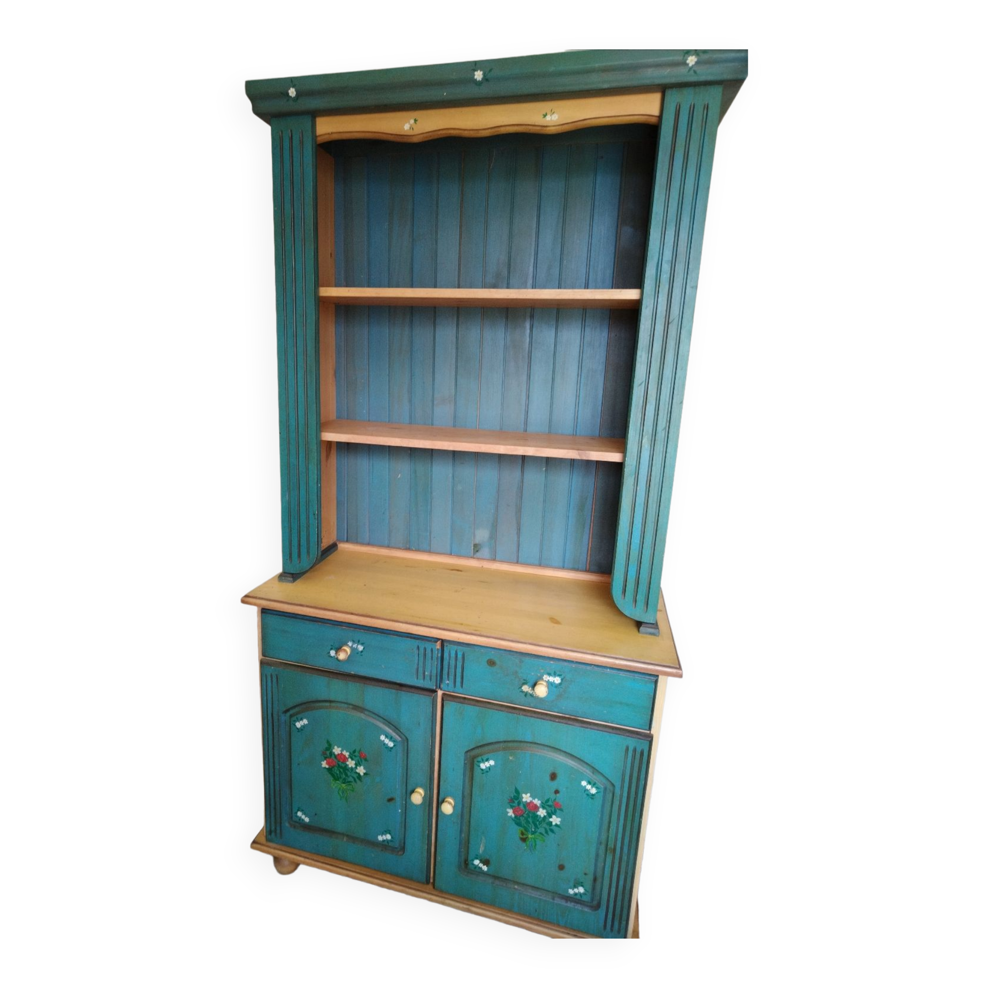 Rustic dresser with floral decor