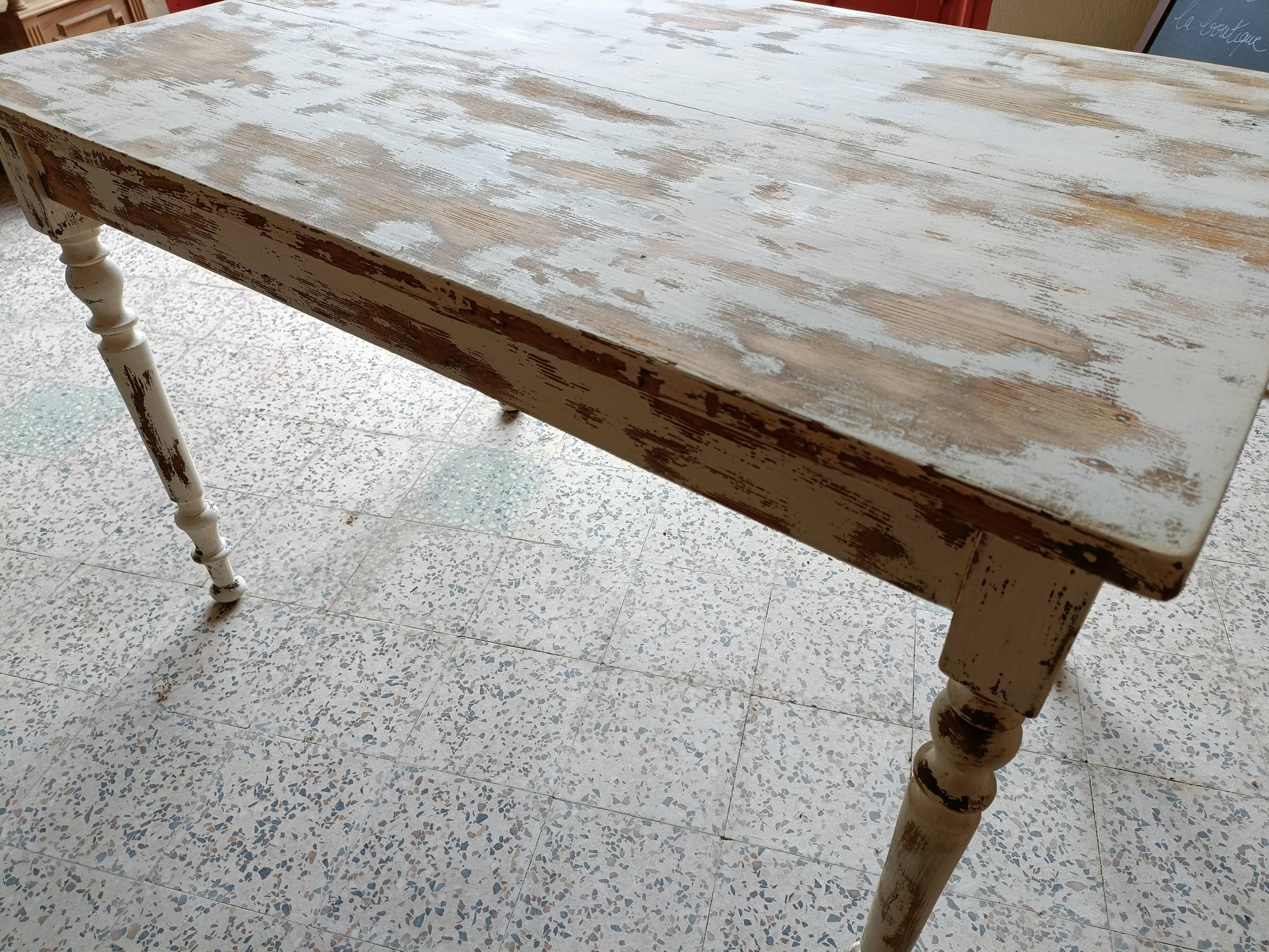 Patinated wooden table, restored.