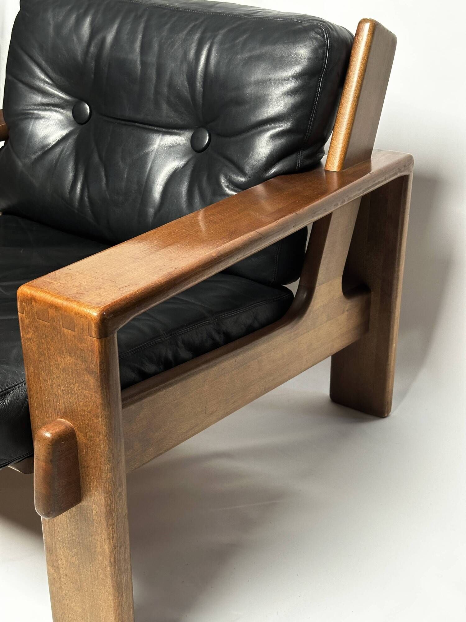 Black leather and wood armchair by Esko Pajamies, 1960s, Finland.
