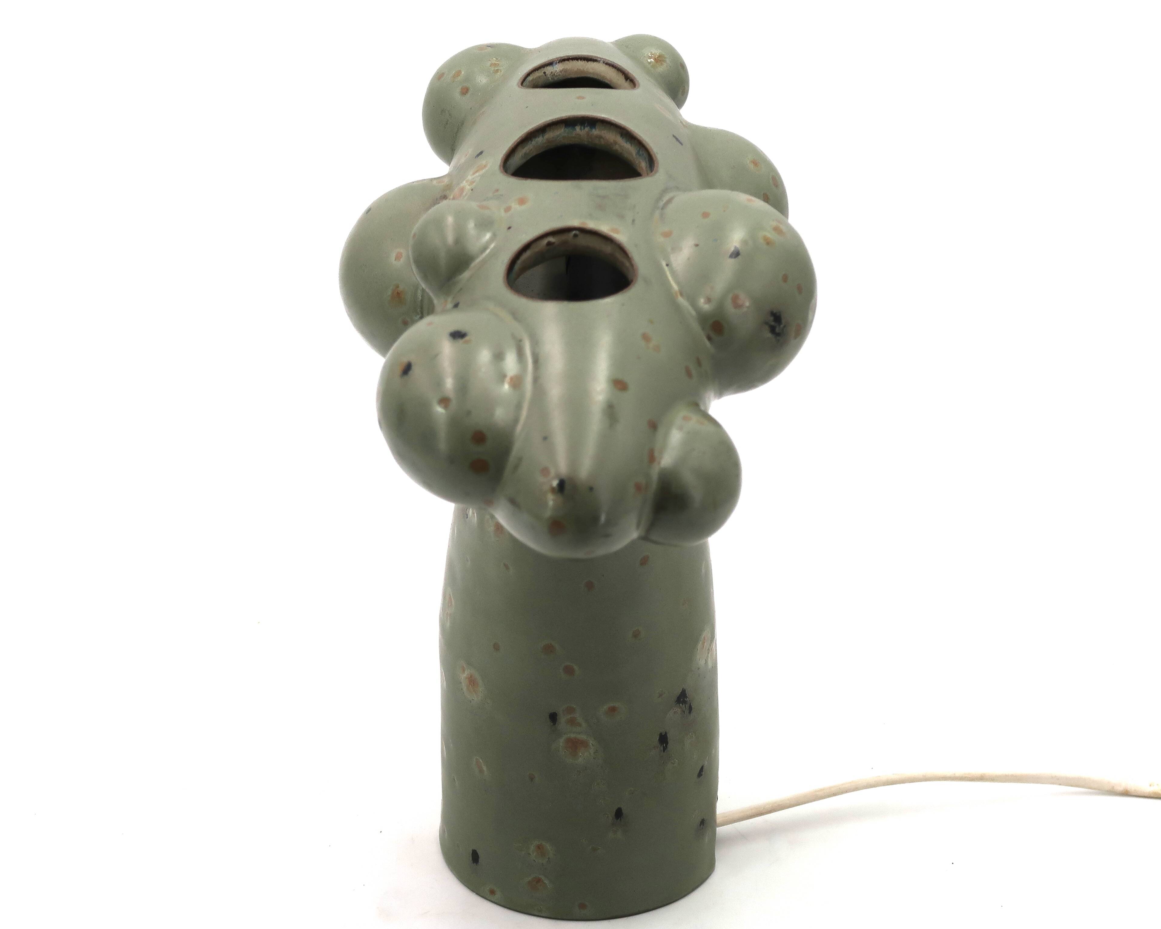 Organic sculptural accent lamp in green ceramic