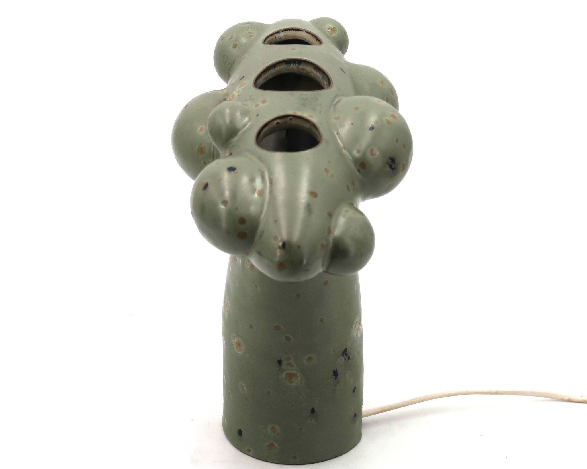 Organic sculptural accent lamp in green ceramic