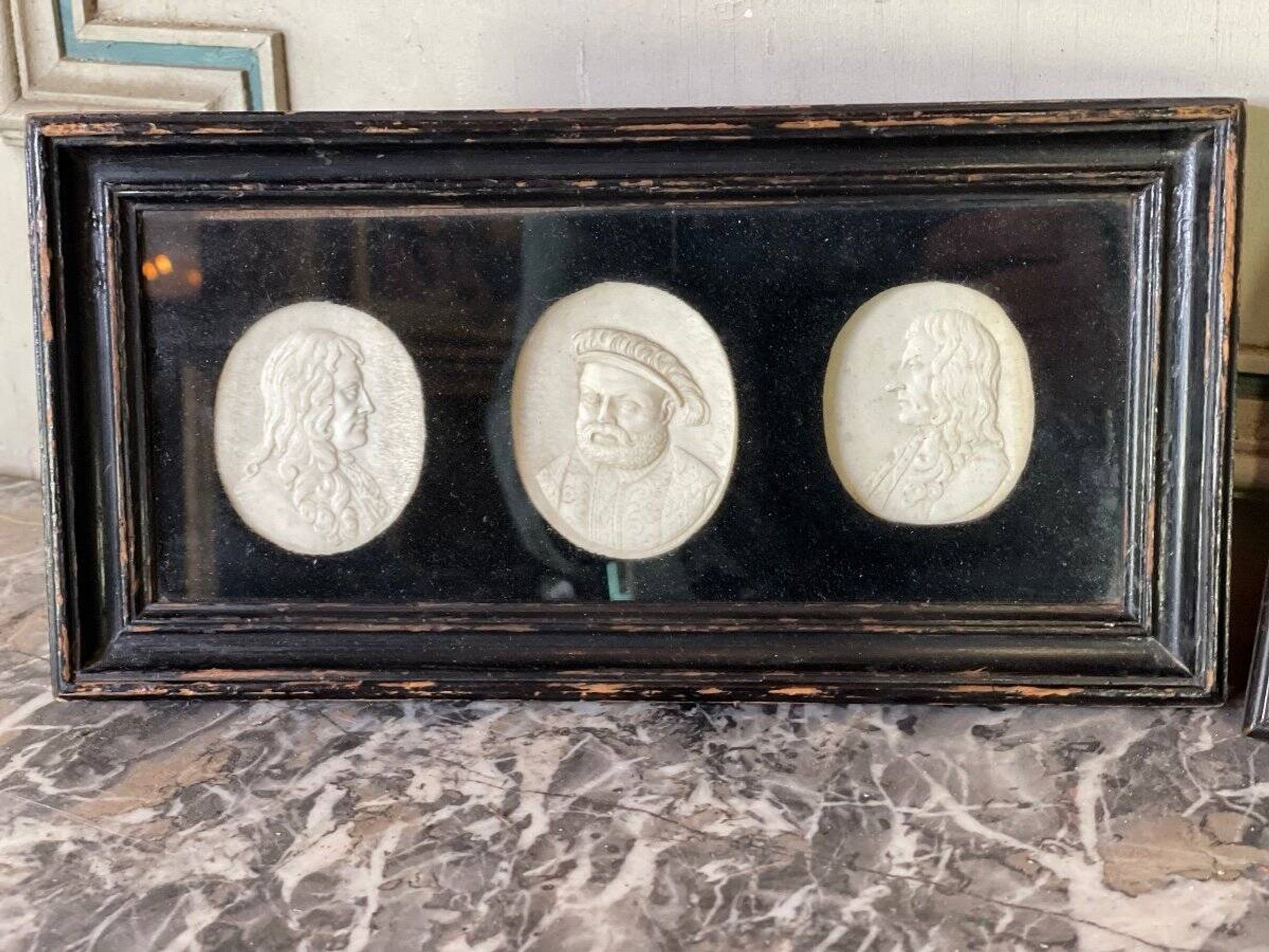 Sculpted ivory portrait suite, England circa 1880, sold in accordance with CITES regulations.
