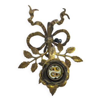 bronze wall light with electrified floral decoration in good condition