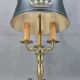 Empire style hot water bottle lamp in solid bronze three lights Lucien Gau