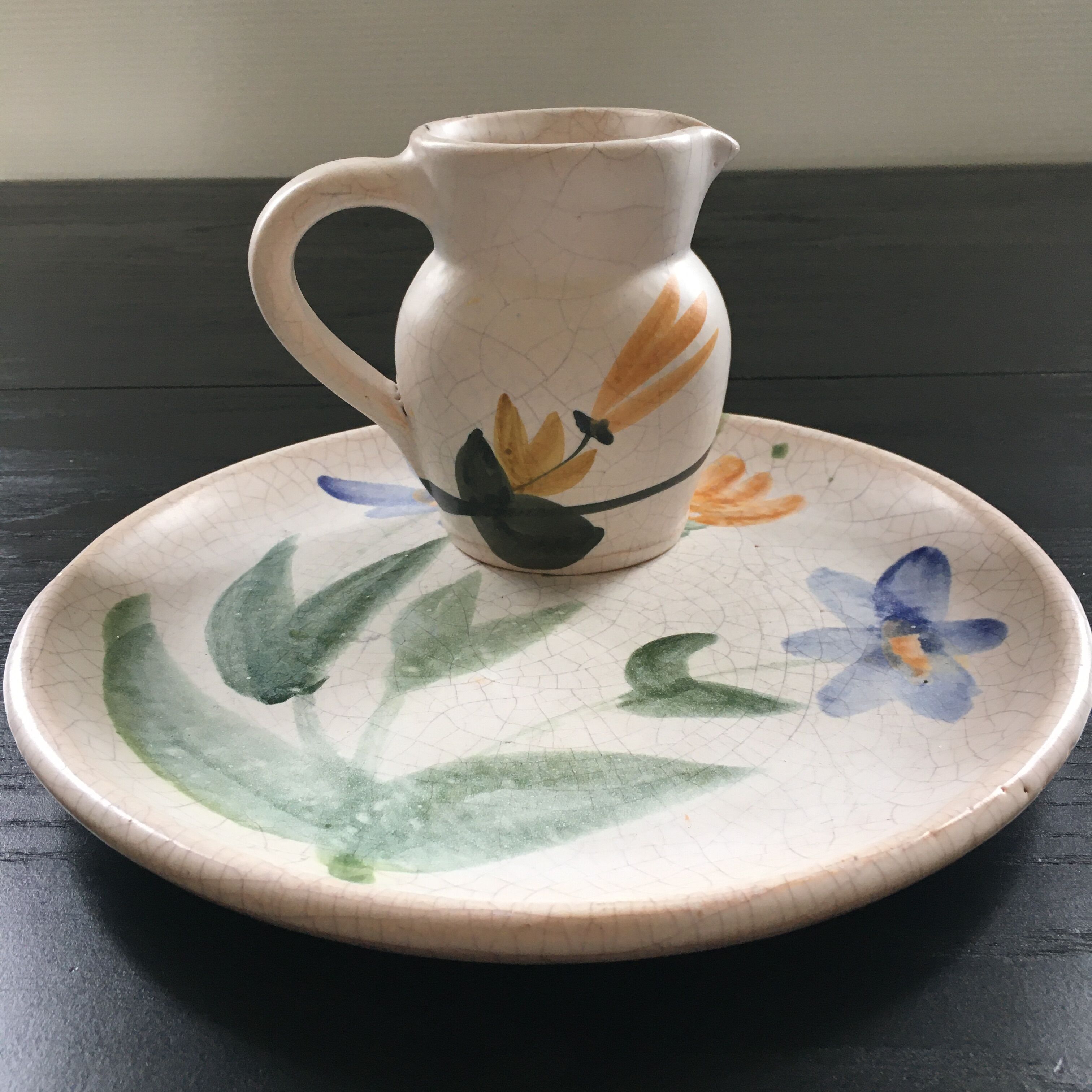 Set plate and jug with floral decoration.