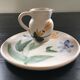 Set plate and jug with floral decoration.