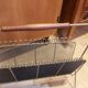 Modernist magazine rack in metal and wood