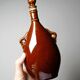 Vintage brown ceramic bottle, flask or canteen from the 1950s-60s.