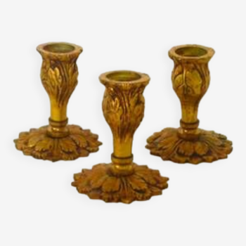 Trio of bronze candlesticks