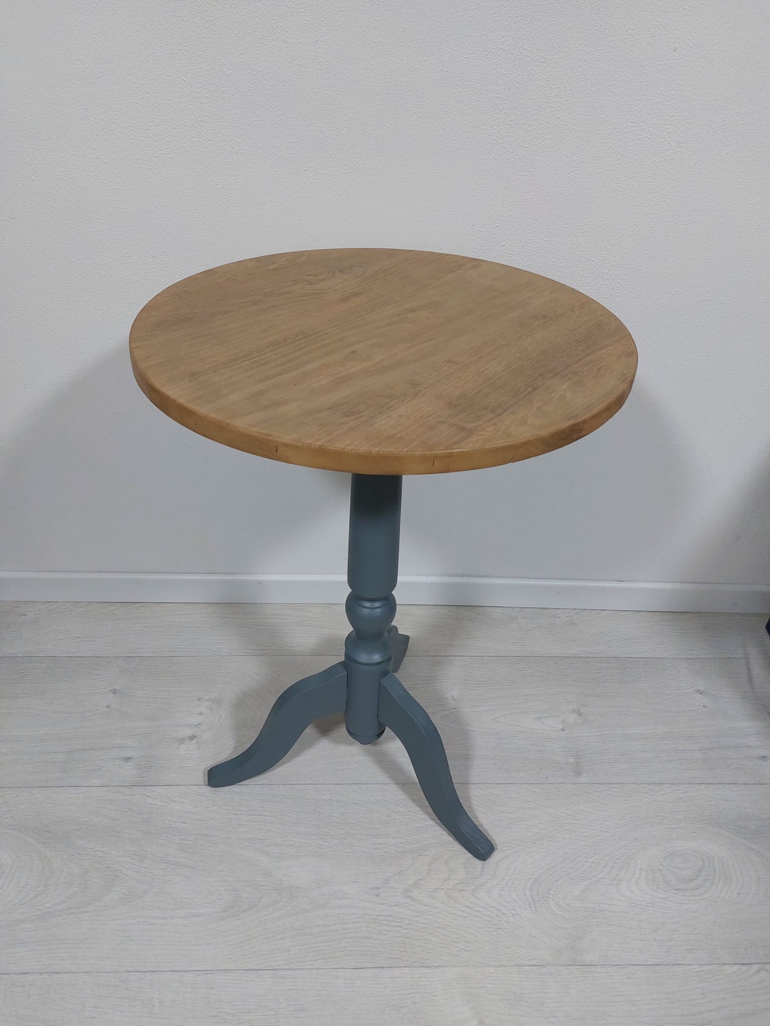 Gray and natural pedestal table