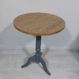 Gray and natural pedestal table