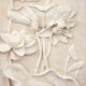 Bas-relief with flowers. Relief with flowers. Flowers in relief.