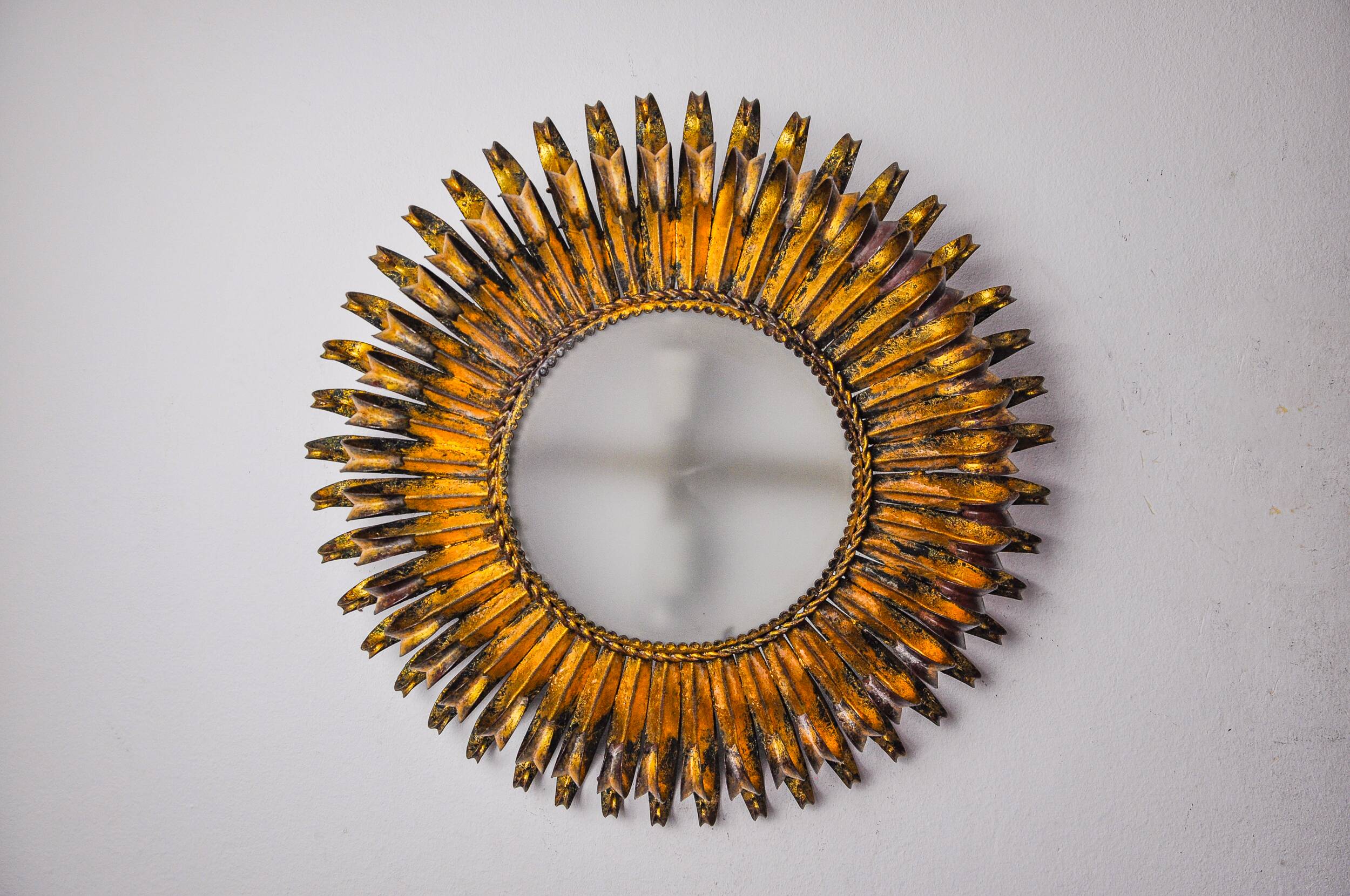 Sun wall lamp by ferro arte, metal and gold leaf, Spain, 1960