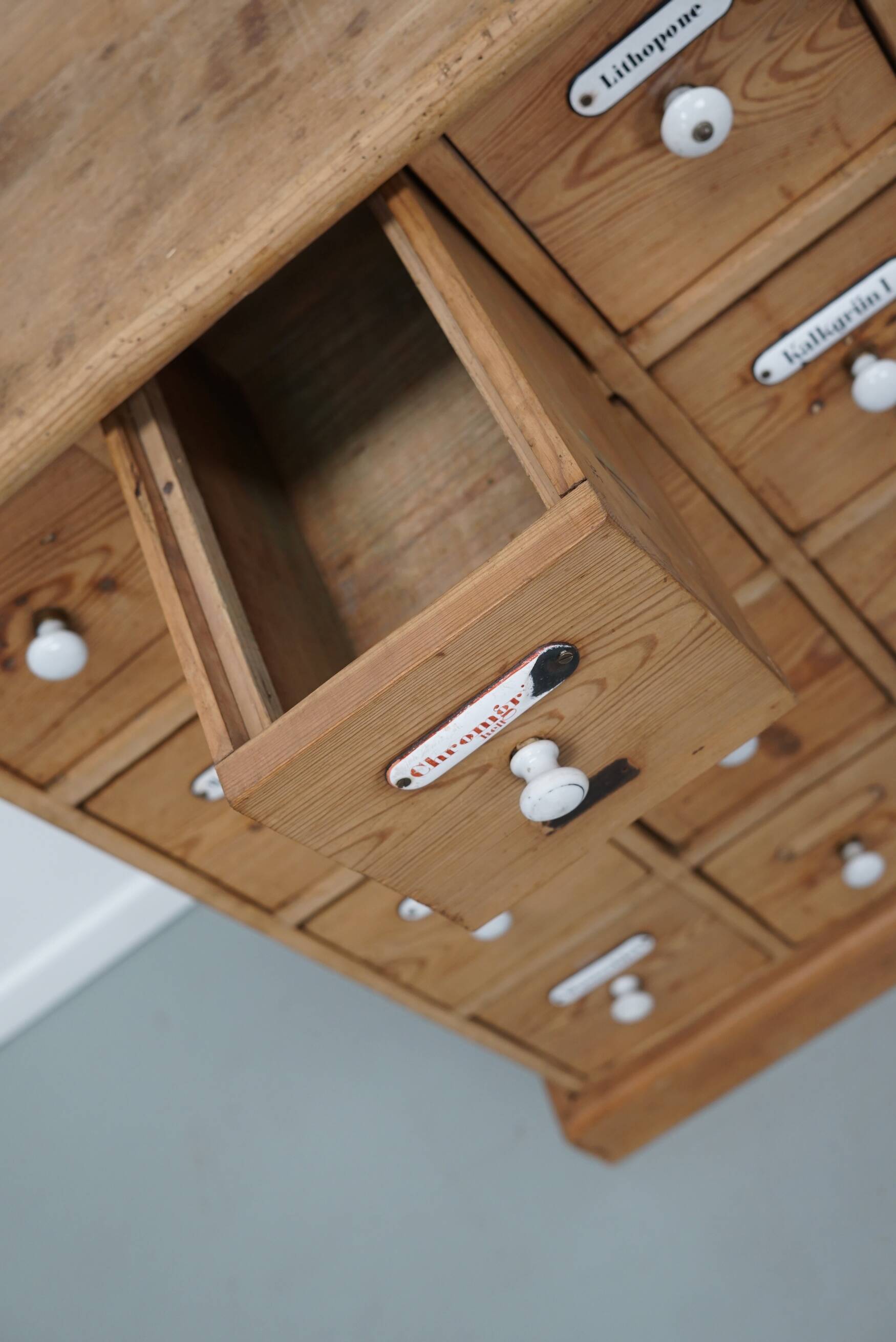 Antique German Pine Apothecary Cabinet with Enamel Shields, 1900s