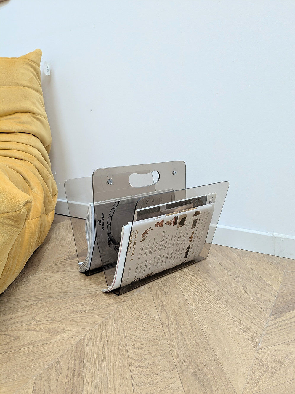 Vintage plexiglass magazine rack from the 70s.