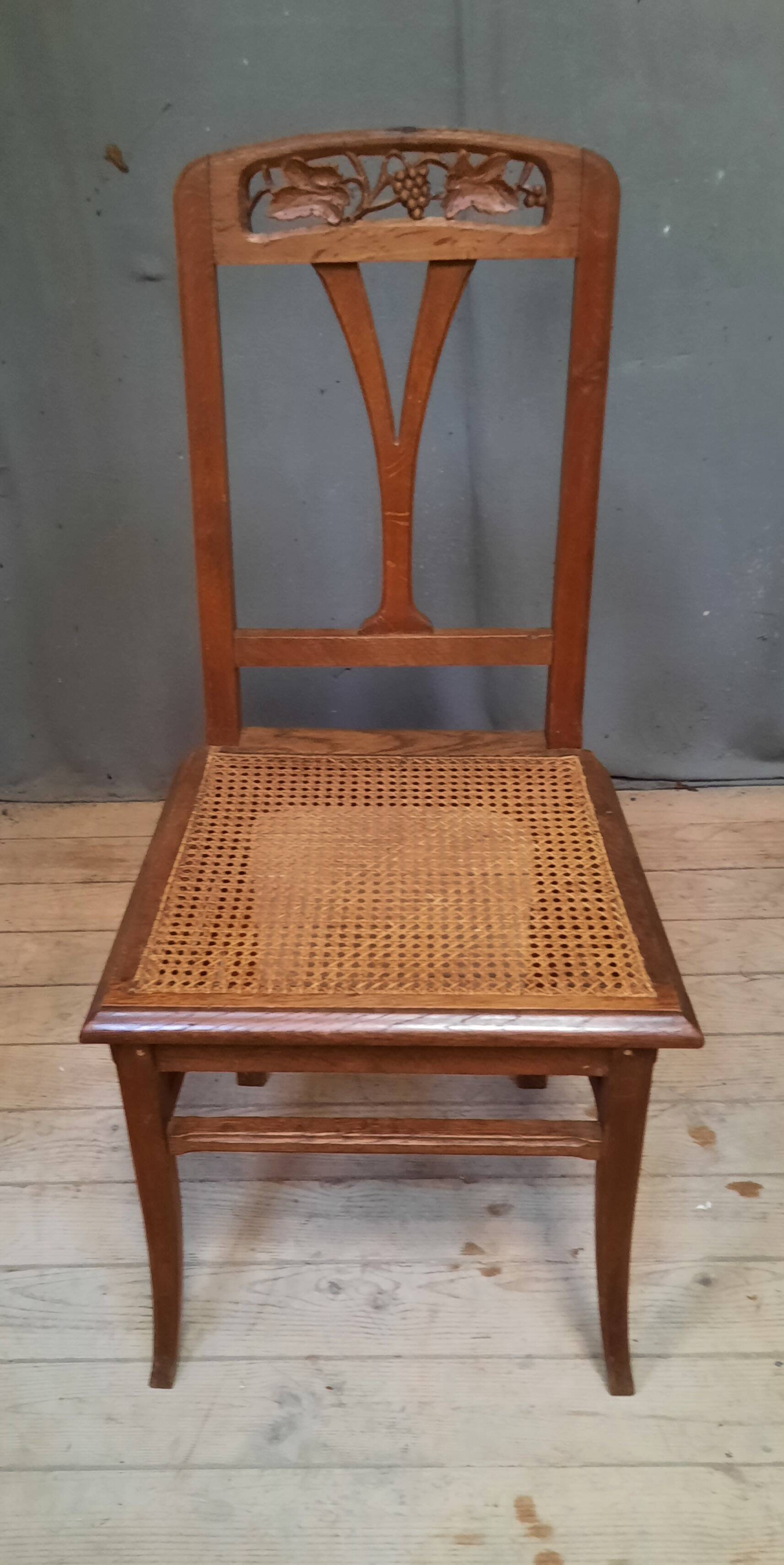 Cane chair in the style of Gauthier Poinsignon